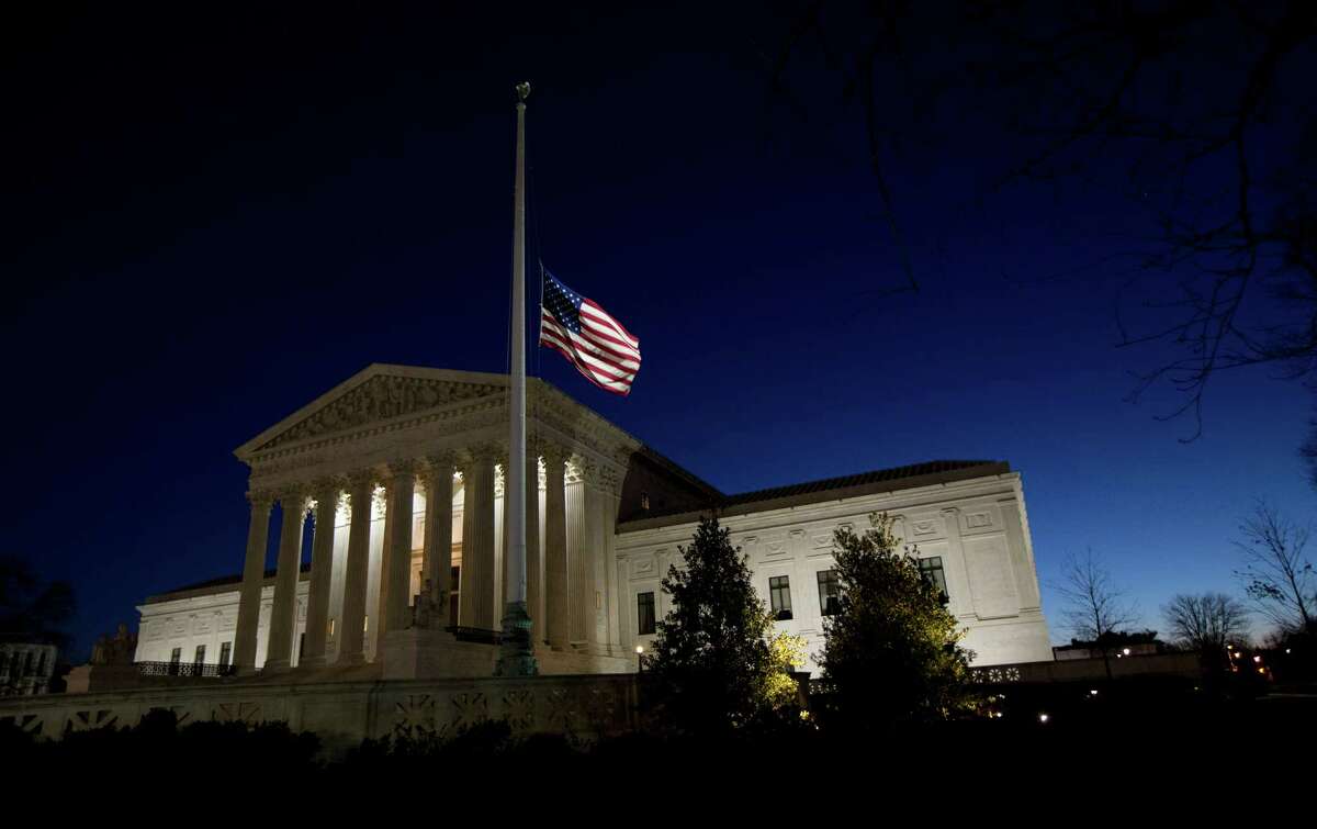 The flag flies at half-staff in front of the Supreme Court building in honor of Supreme Court Justice Antonin Scalia, who died over the weekend. Republicans say the nomination of a new justice should be delayed until after the presidential election. A reader wonders if they would feel the same way if a Republican were in the Oval Office.