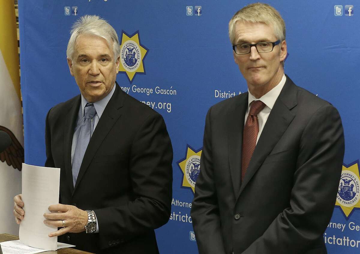 San Francisco District Attorney George Gascón, left, and FBI Special Agent in Charge David J. Johnson speak at a news conference in San Francisco, Tuesday, Feb. 16, 2016. (AP Photo/Jeff Chiu)