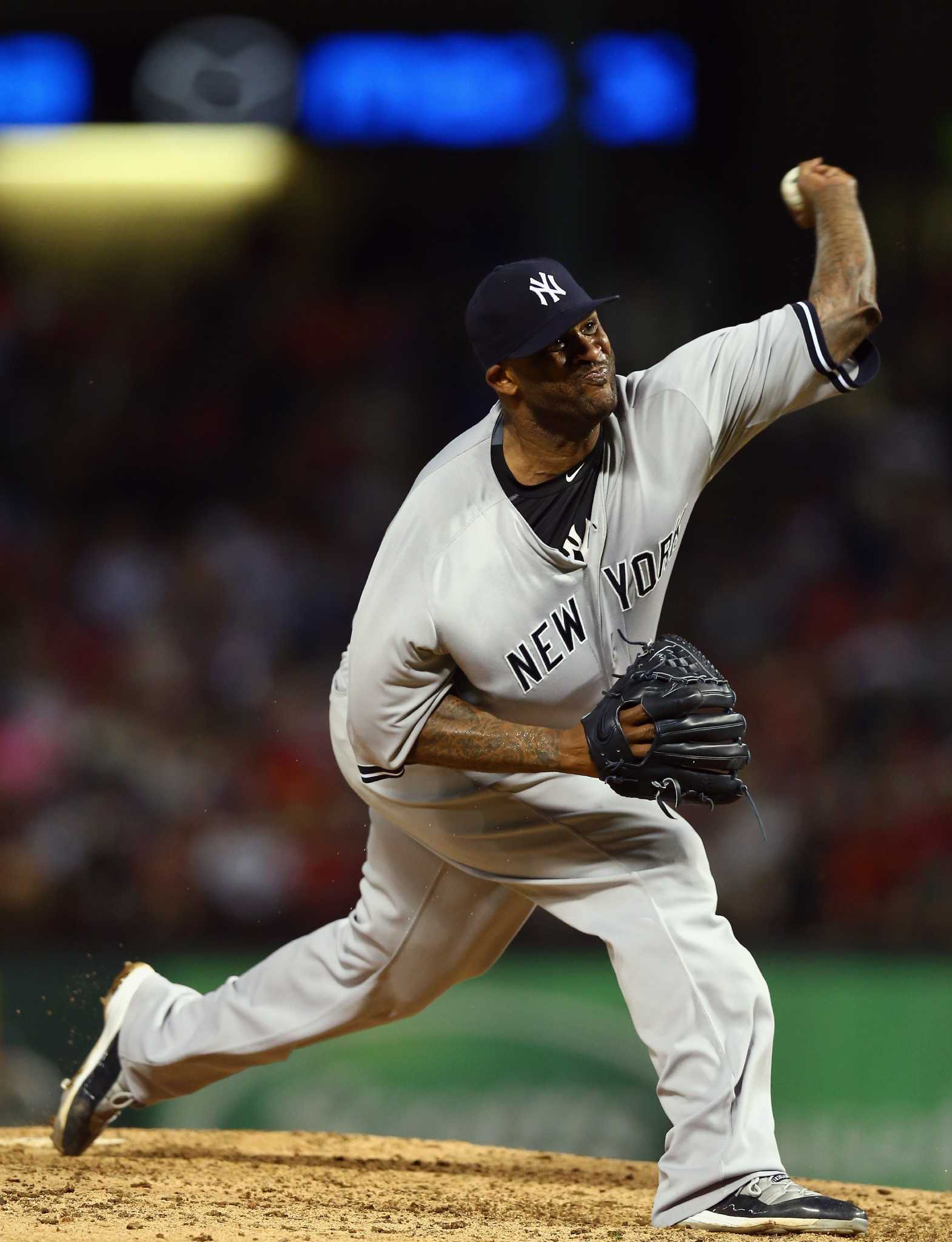 JUL 30, 2015: New York Yankees starting pitcher CC Sabathia #52 during an  MLB game between the New York Yankees and the Texas Rangers at Globe Life  Park in Arlington, TX Texas