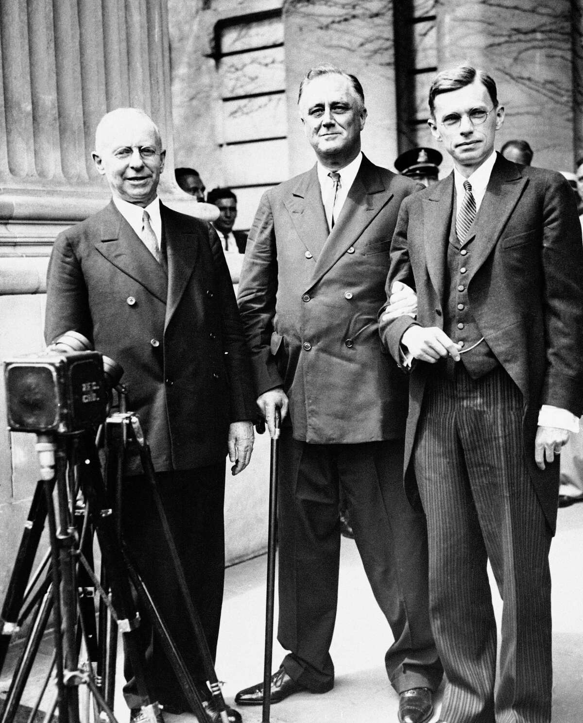 President Franklin D. Roosevelt, is shown just after he received the honorary degree of Doctor of Laws from Yale University, New Haven, Conn., June 20, 1934. From left to right: President James Rowland Angell of Yale; Pres. Roosevelt; and President James Bryant Conant of Harvard University, who also received an honorary degree from Yale.