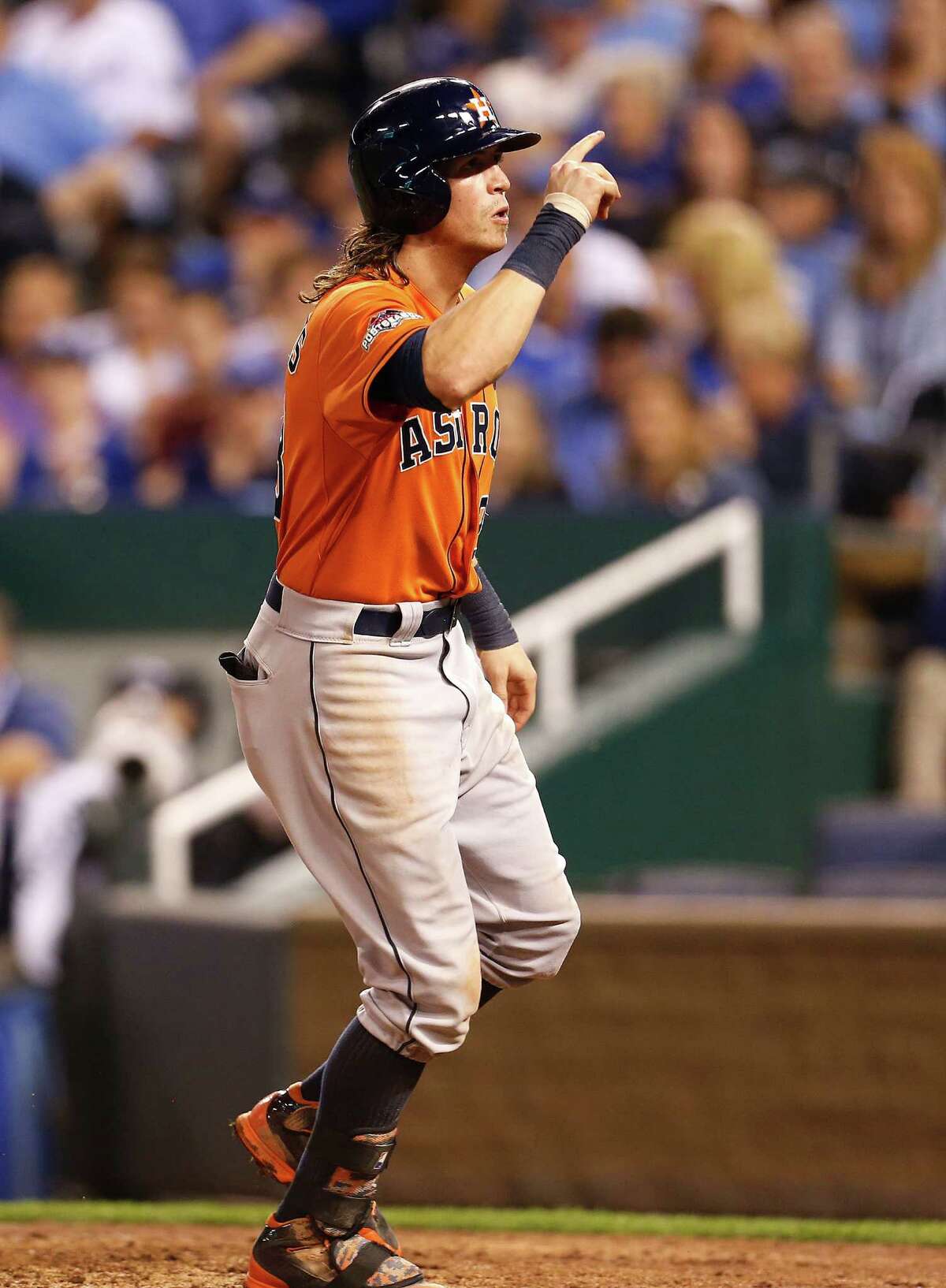 Houston Astros left fielder Colby Rasmus celebrates after hitting a solo home run in the top of the eighth inning. Game 1 of the American League Division Series at Kauffman Stadium on Oct. 8, 2015, in Kansas City.