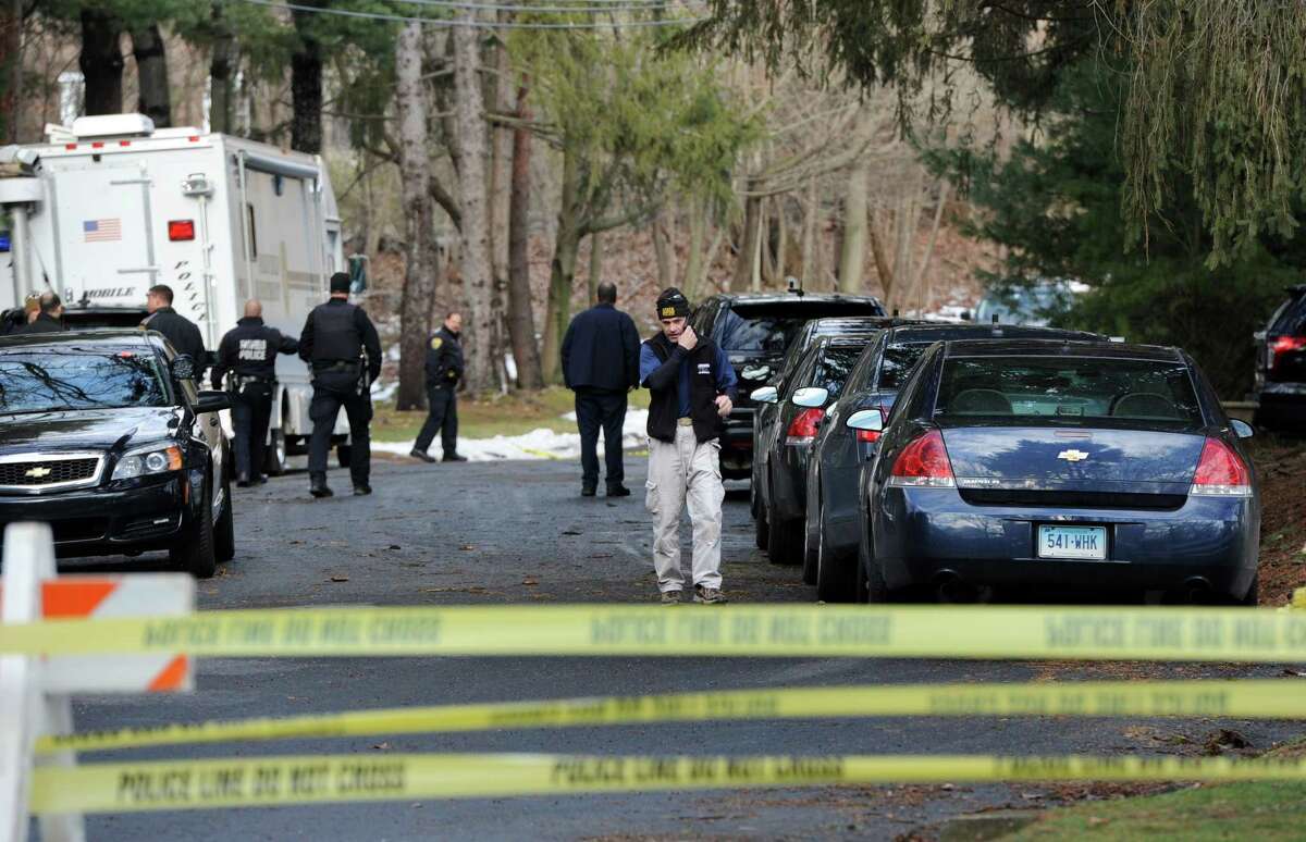 A day after Christopher Andrews was fatally shot by a police officer during a violent domestic disturbance at his home on Mountain Laurel Rd. in Fairfield, Conn., police were still on the scene investigating the incident on Wednesday, Feb. 17, 2016.