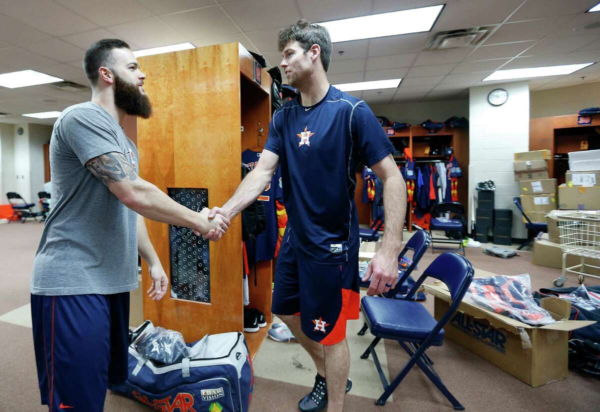 Houston Astros ace Dallas Keuchel (left) meets new teammate Doug Fister in the clubhouse during report day for pitchers and catchers at their Osceola County facility, in Kissmmee, Fla., on Thursday, Feb. 18, 2016.