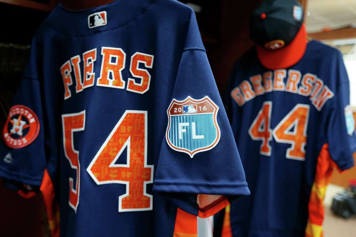 Houston Astros Mike Fiers' and Houston Astros Luke Gregerson's spring training jersey hang in their lockers during report day for Houston Astros pitchers and catchers at their Osceola County facility, in Kissmmee, FL, Thursday, Feb. 18, 2016.