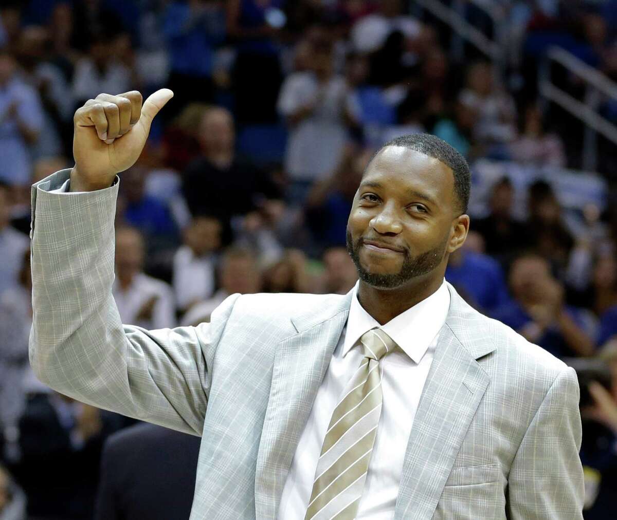 Now an NBA analyst for ESPN's ﻿"The Jump," Tracy McGrady says he had to adjust his game when a trade to the Rockets made him Yao Ming's teammate.