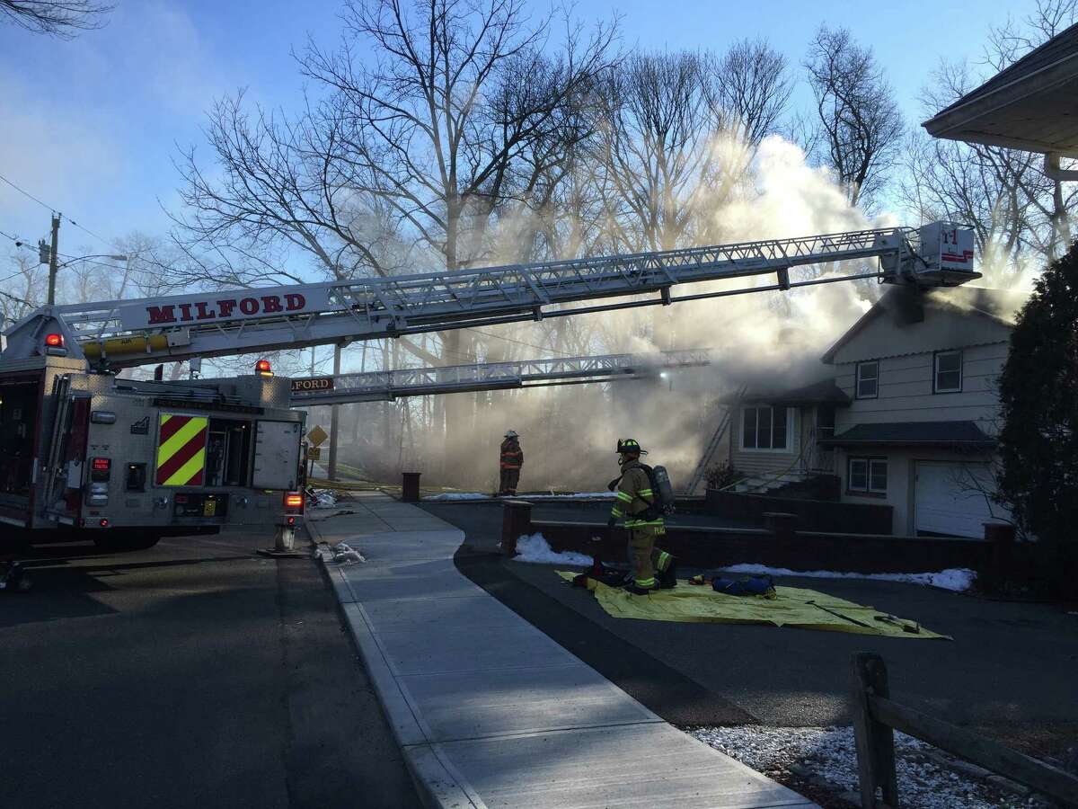 Milford firefighters douse house fire