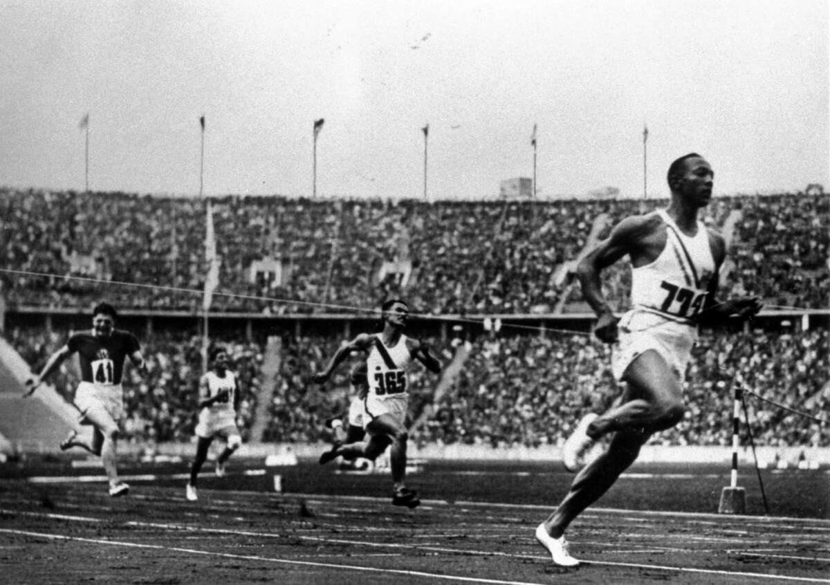 Historic Photos Show Jesse Owens Smashing World Records At Hitler s 