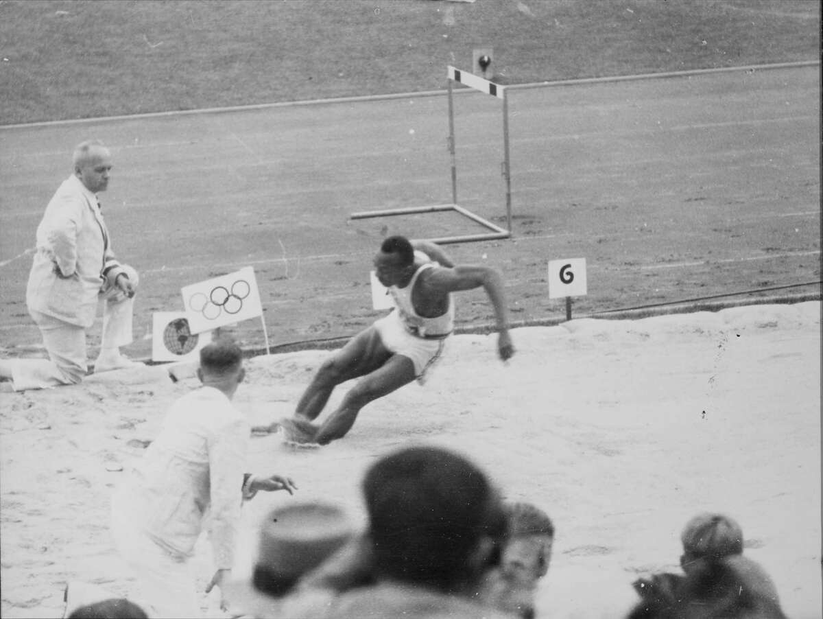 Historic Photos Show Jesse Owens Smashing World Records At Hitler S 1936 Olympics