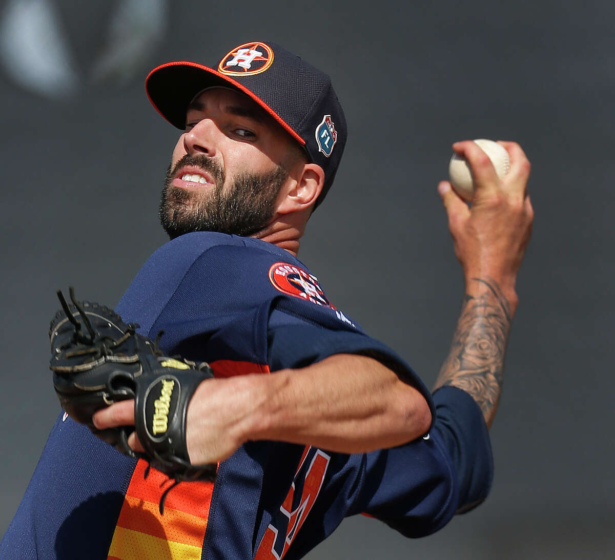 Houston Astros pitcher Mike Fiers pitches off the ten-pack during spring training in Kissimmee, Florida, Saturday, Feb. 20, 2016.