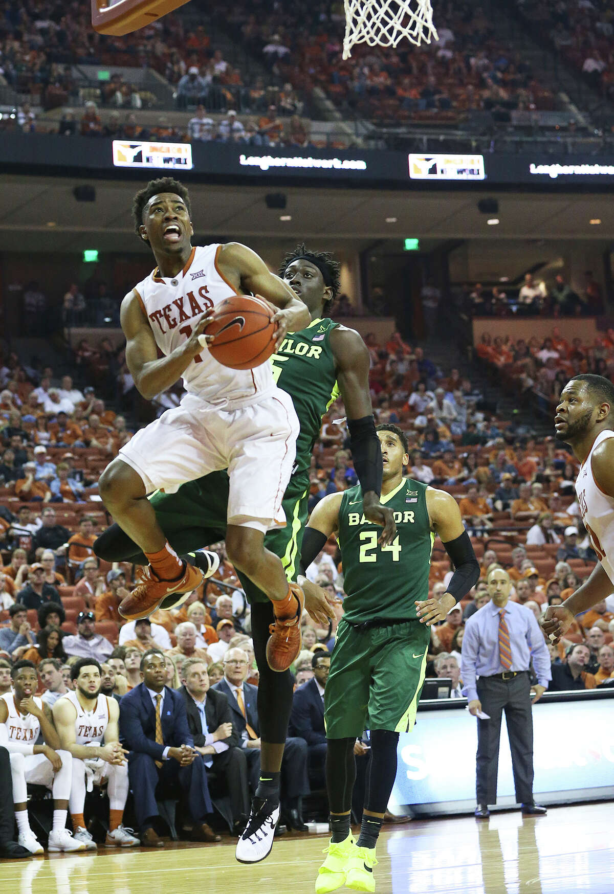 Longhorn guard Isaiah Taylor gets past Johnathan Motley as UT hosts Baylor in men's basketball at the Erwin Center on February 20, 2016.