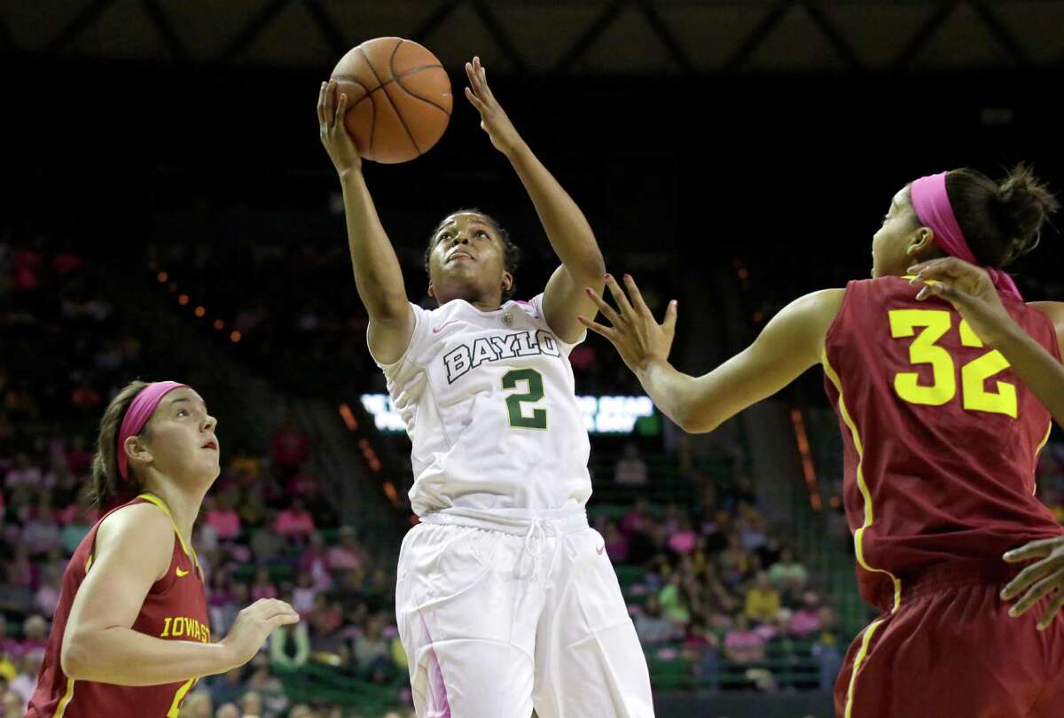 Baylor guard Niya Johnson drives to the basket against Iowa State defenders on Saturday. Johnson had 13 points, 10 rebounds and eight assists in the Bears' win.