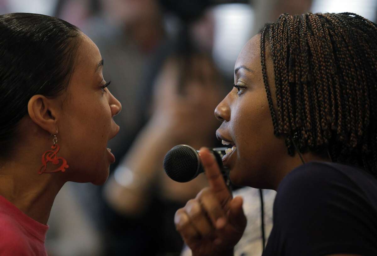 Sister Erinne, left, and Rev. Marlee-I sing during Sunday service at St. John Coltrane African Orthodox Church on Sunday, February 21, 2016, in San Francisco, Calif., on Sunday, February 21, 2016. The church is in peril of possible eviction from the West Bay Conference Center.