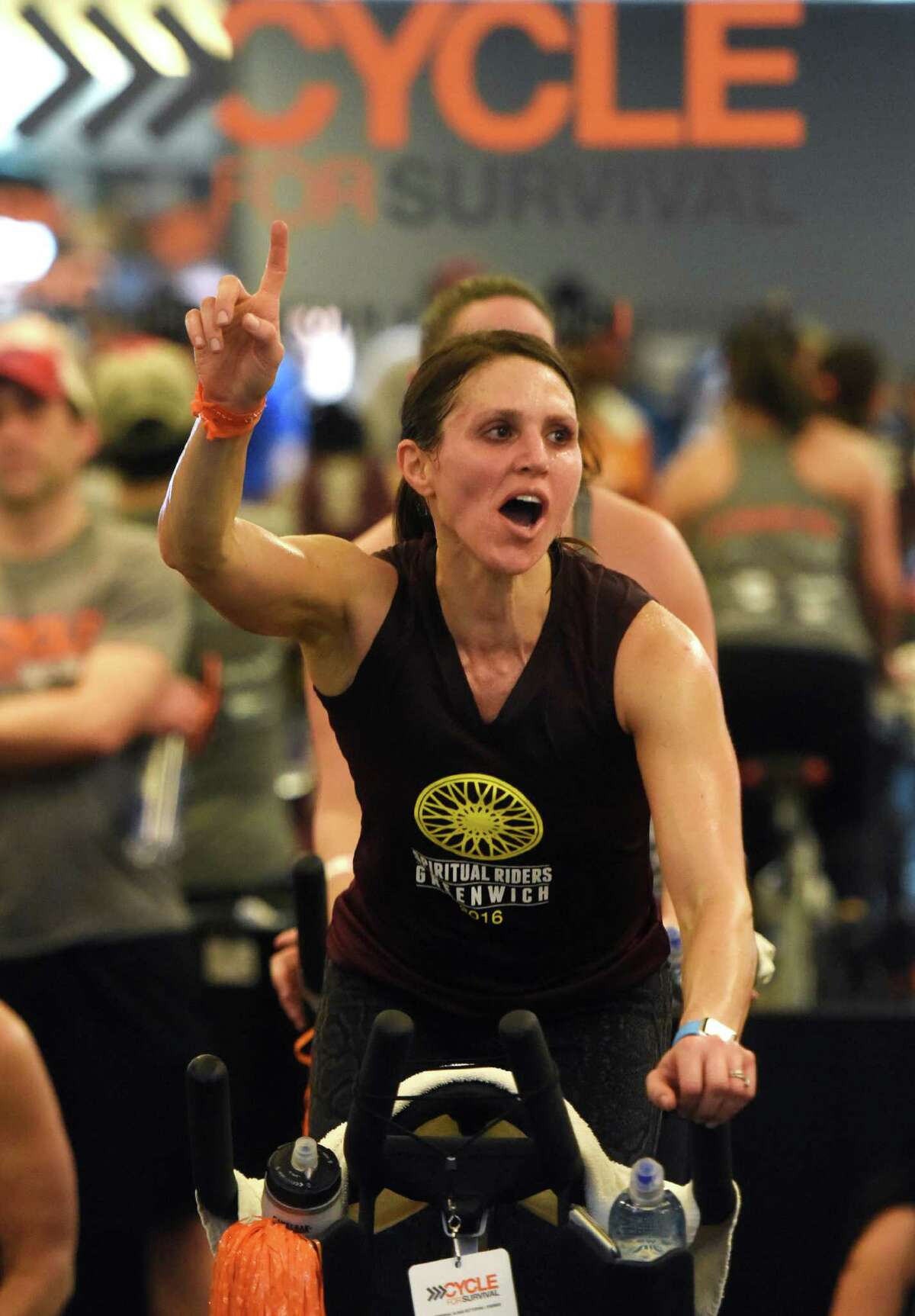 Lachmont, N.Y. resident Alexis Katz, of team Spiritual Riders, rides during the Cycle for Survival indoor cycling fundraiser at Equinox in Greenwich, Conn. Sunday, Feb. 21, 2016. Cycle for Survival, owned and operated by Memorial Sloan Kettering, is a fundraiser with the goal to beat rare cancers by raising money through a series of indoor cycling events across the country. 2016 marks the tenth year of rides and the event has raised over $90 million since 2007. More than 800 riders participated at the event in Greenwich Sunday and the Spiritual Riders team led the way raising more than $140,000 alone.