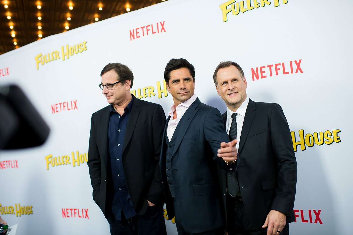 (L-R) Actors Bob Saget, John Stamos, and Dave Coulier attend the premiere of Netflix's 'Fuller House' at Pacific Theatres at The Grove on February 16, 2016 in Los Angeles.