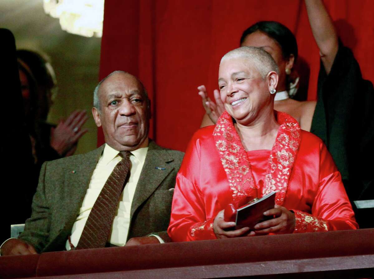 FILE - This Oct. 26, 2009 file photo, comedian Bill Cosby, left, and his wife Camille appear at the John F. Kennedy Center for Performing Arts before Bill Cosby received the Mark Twain Prize for American Humor in Washington. A judge has denied a request by lawyers for Bill Cosby's wife to postpone her deposition in a defamation lawsuit brought by seven women who claim the comedian sexually assaulted them. The judge ruled late Sunday, Feb. 20, 2016, that the deposition, scheduled for Monday, can proceed. (AP Photo/Jacquelyn Martin, File) ORG XMIT: CAET709