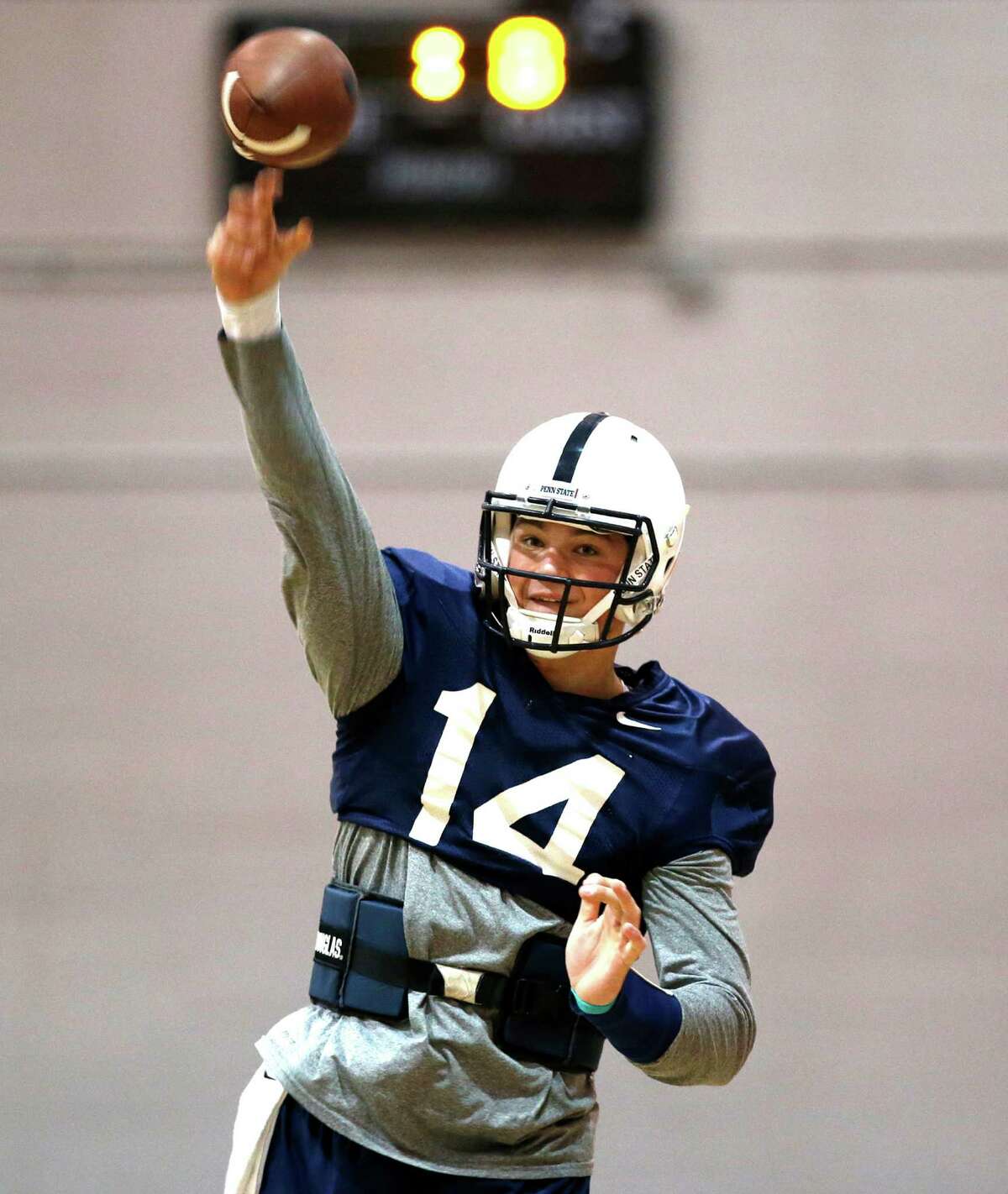 Penn State quarterback Christian Hackenberg throws during NCAA college football practice, Wednesday, Dec. 24, 2014, at Fordham University's Field House in New York. Penn State is scheduled to play Boston College in the Pinstripe Bowl on Saturday. (AP Photo/Kathy Willens)