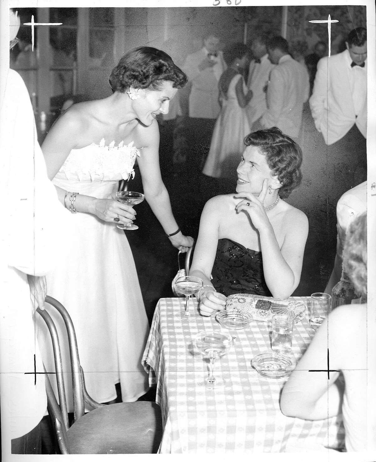  Constance Crowley Bowles, seated, with Beverly Nickel in 1954.