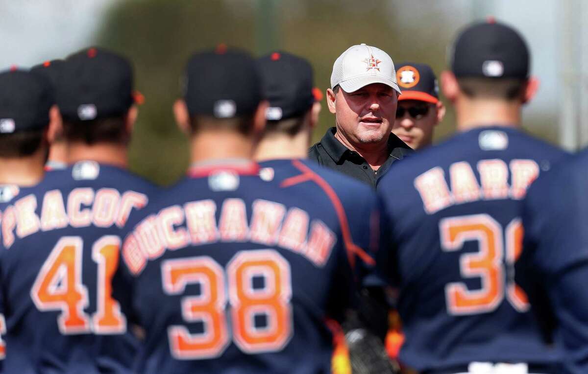 Former Houston Astros pitcher Roger Clemens talks with pitchers during the first full-squad workouts at the Astros spring training in Kissimmee, Florida, Tuesday, Feb. 23, 2016.( Karen Warren / Houston Chronicle )