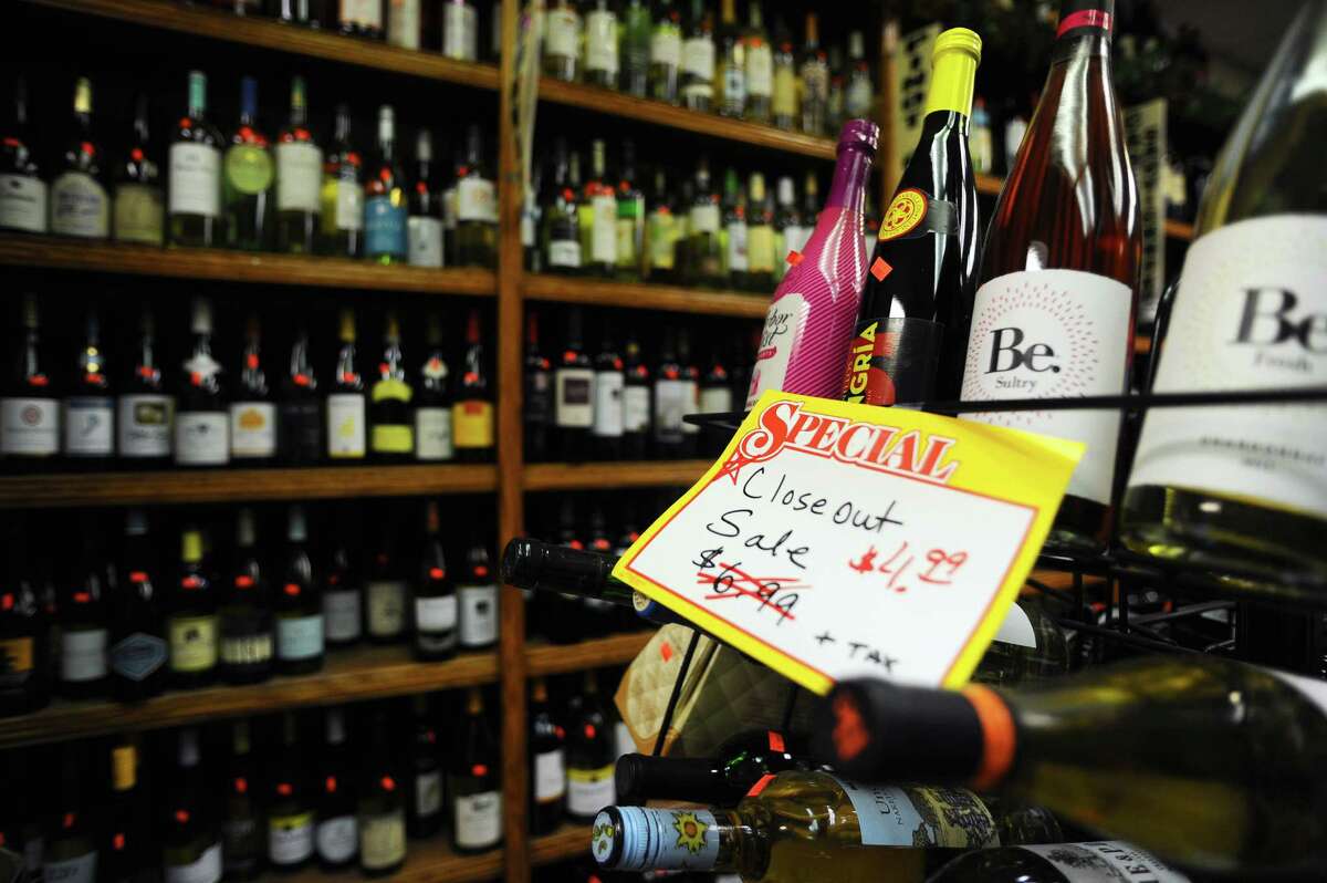 A section of wine on sale inside Hope Bottle Shop, in Springdale. Connecticut officials are discussing eliminating minimum pricing for alcohol, which small business owners claim hurts them and favors big box retailers.