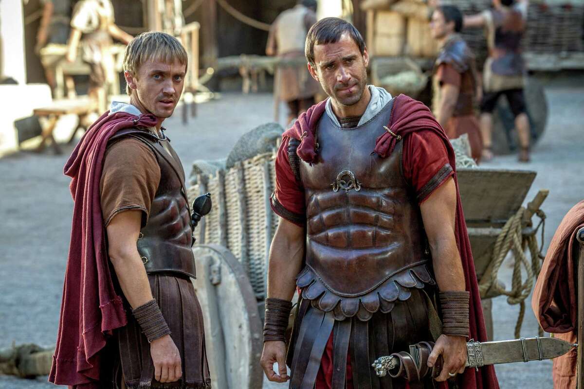 Tom Felton, left, as Lucius and Joseph Fiennes as Clavius in Columbia Pictures' "Risen." Fiennes says the movie's message is broader than faith themes.