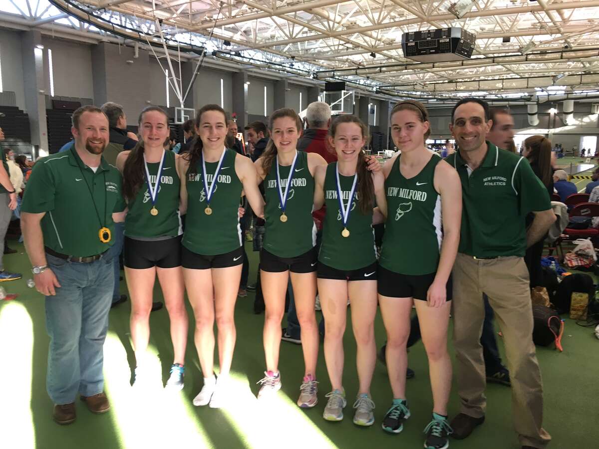 From left, Ryan Fitzsimmons, Brigit Humphreys, Mia Nahom, Hannah Tower, Riley Peragine, Raquel Morehouse and Mike Nahom are all smiles after a big day at the CIAC State Open. The team of Peragine, Humphreys, Nahom and Tower won the 4x800 relay championship.