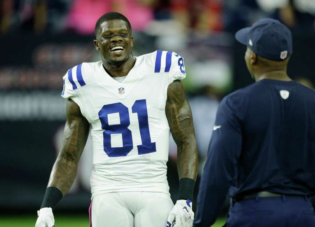 Indianapolis Colts wide receiver Andre Johnson (81) laughs with one of his former Texans coach during pregame at NRG Stadium on Thursday, Oct. 8, 2015, in Houston. ( Brett Coomer / Houston Chronicle )