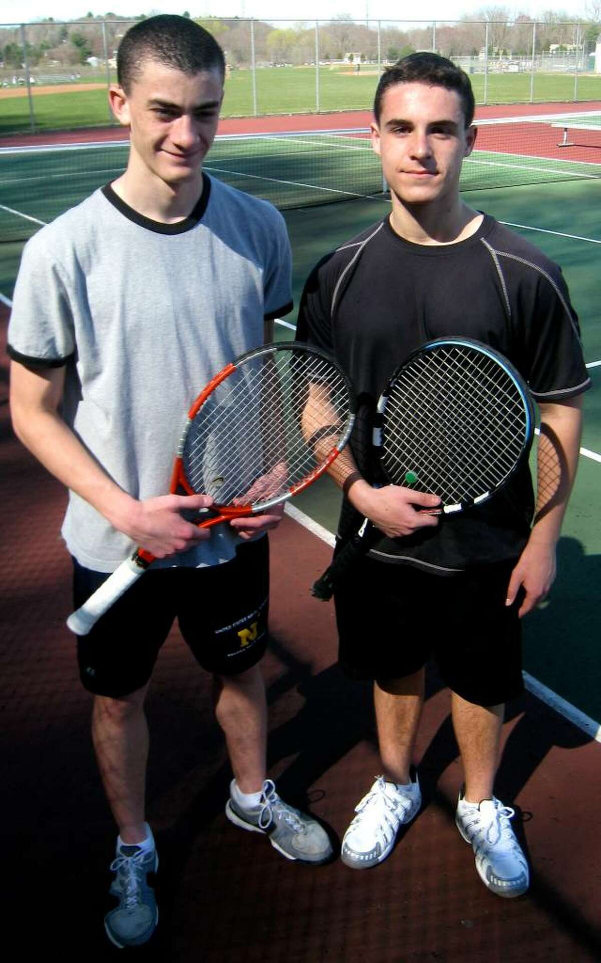 SPECTRUM/New Milford High School boys' tennis captains for 2010, Jack Burns, left, and Josh Jugler