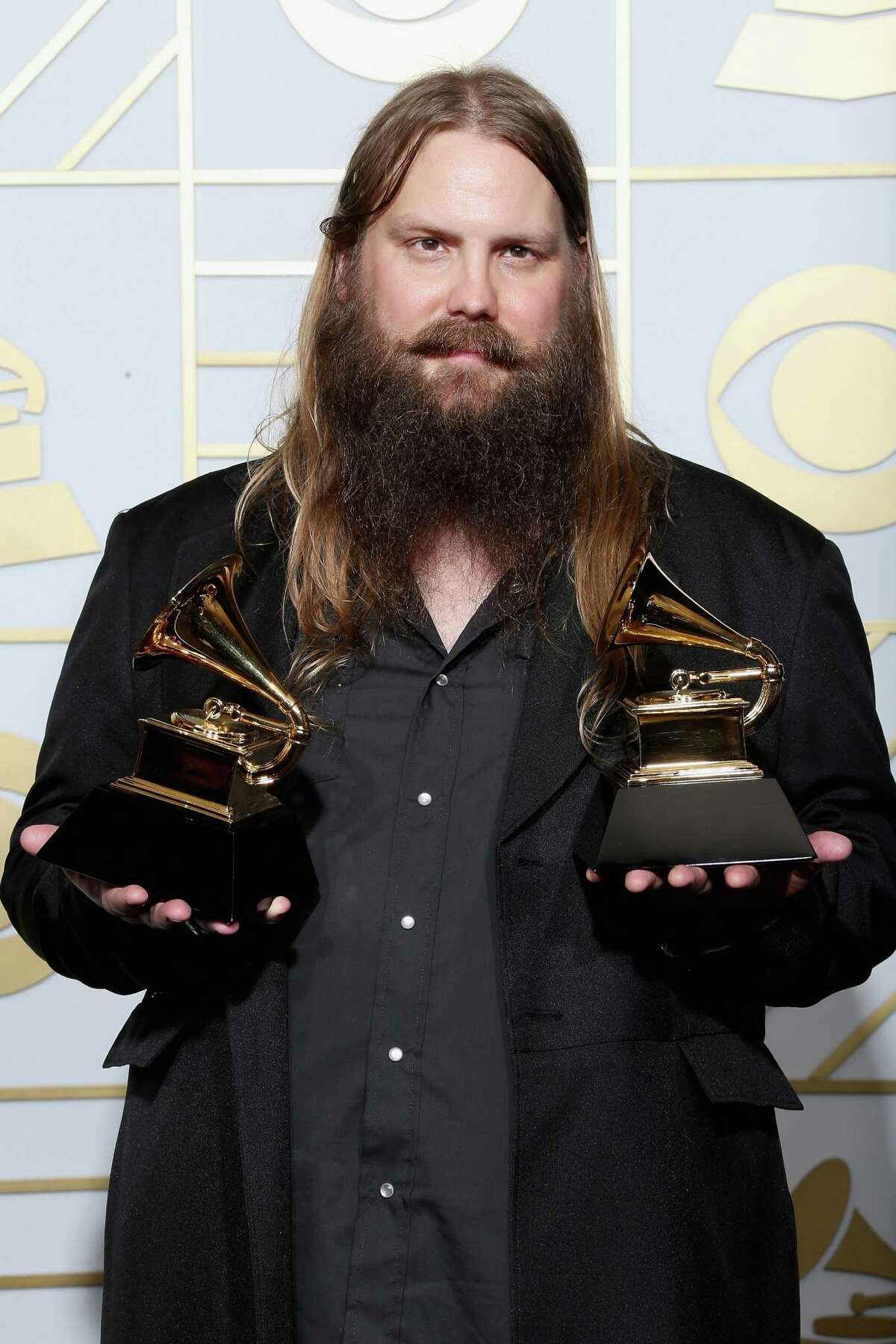 LOS ANGELES, CA - FEBRUARY 15: Musician Chris Stapleton, winner of Best Country Album and Best Country Solo Performance for 'Traveller,' poses in the press room during The 58th GRAMMY Awards at Staples Center on February 15, 2016 in Los Angeles, California. (Photo by Frederick M. Brown/Getty Images for NARAS)