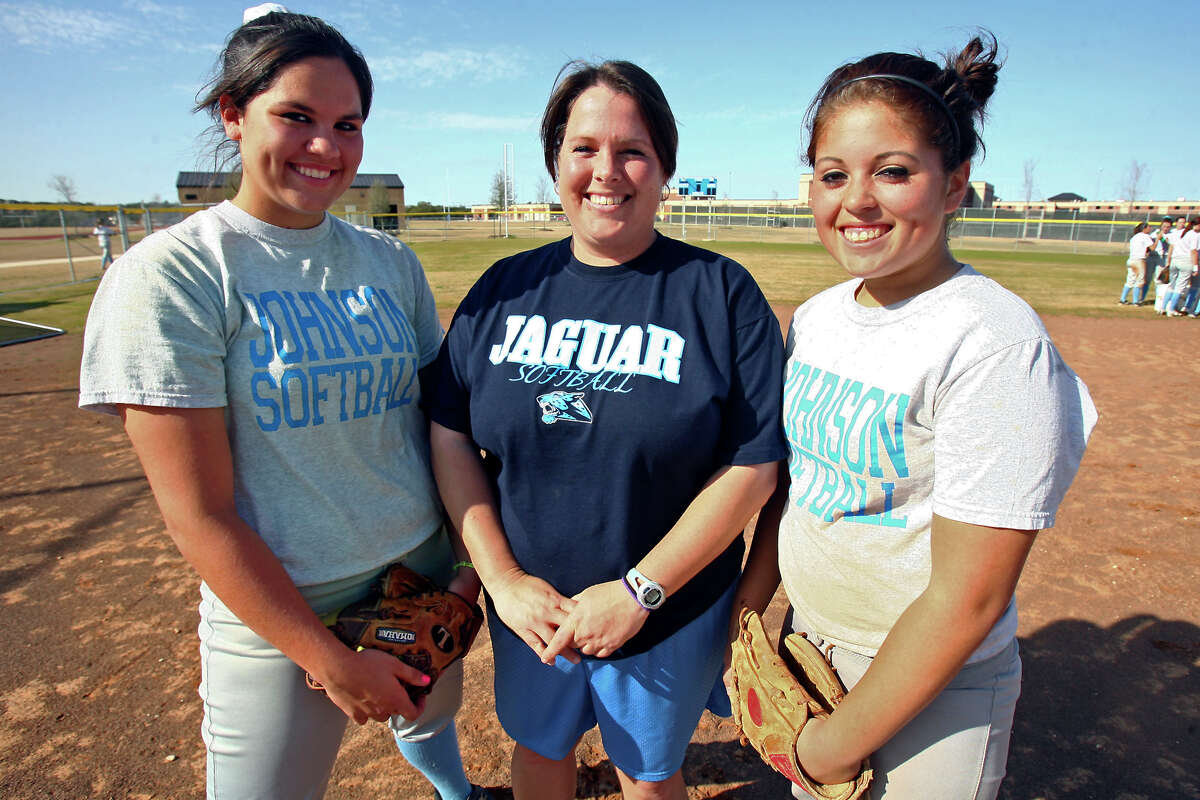 Johnso softball coach Jennifer Fox (center) and players Jori Fox (left) and Geena Garcia pose for a portrait at the school on Feb. 12, 2009.
