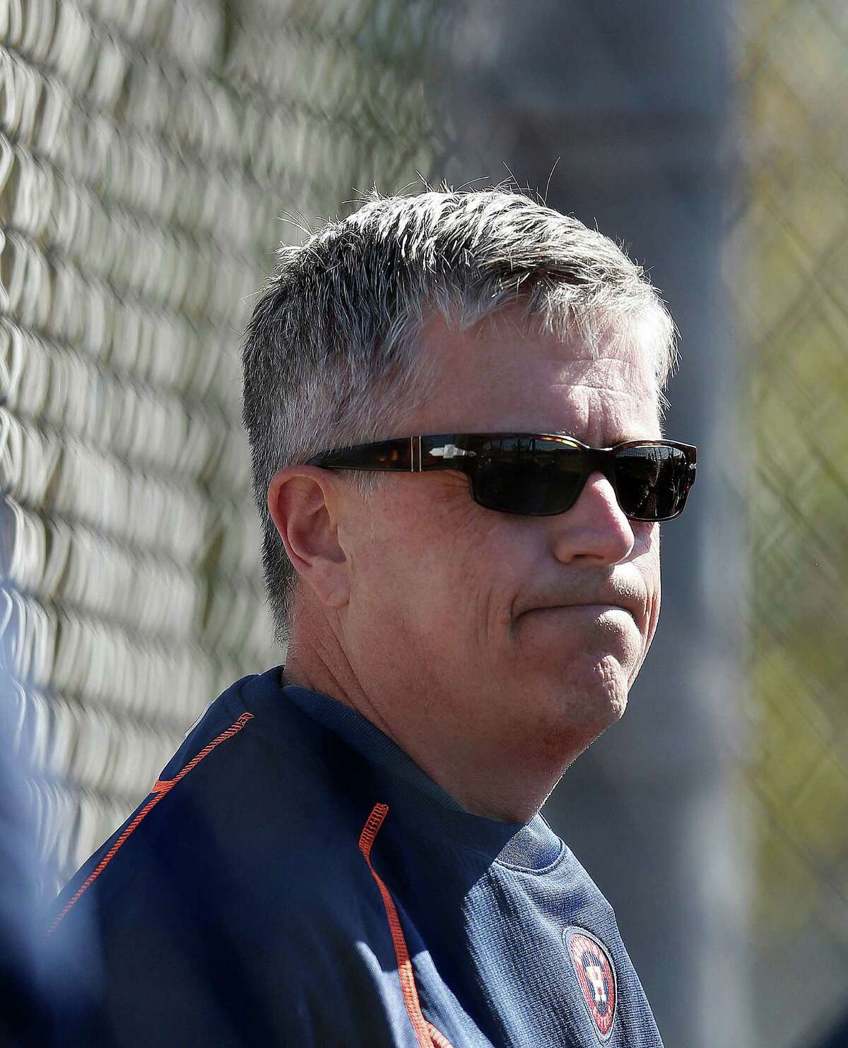 Houston Astros GM Jeff Luhnow watches live batting practice at the Astros spring training in Kissimmee, Florida, Thursday, Feb. 25, 2016.