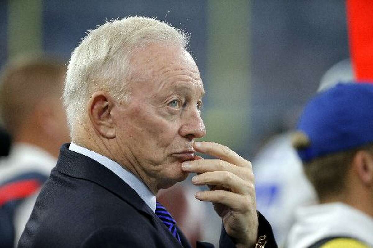 Dallas Cowboys owner Jerry Jones seems nervous as he stands on the sideline during a game against the Seattle Seahawks last year. A reader faults Jones for bringing in players who have run afoul of the law.