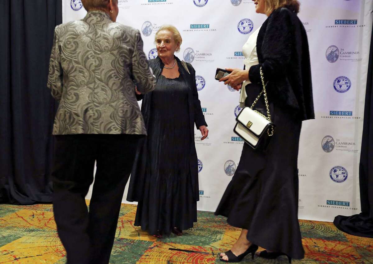 Former Secretary of State Madeleine K. Albright (center) greets people before posing for photos Thursday Feb. 25, 2016 during the World Affairs Council of San Antonio 2016 International Citizen of the Year Gala held at the Marriott Rivercenter.
