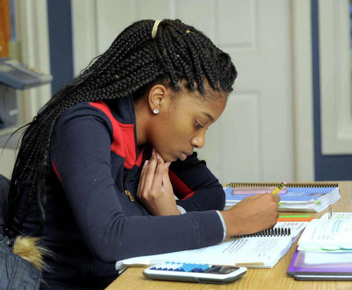 Zhane Dimmitt, 16, left, a junior at Danbury High School, studies for her SAT at the Sylvan Learning Center in Brookfield