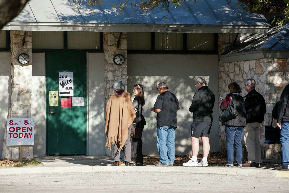 A line forms at the entrance of Lions Field Adult Center where voters wait during the last day of early voting Friday Feb. 26, 2016. The polls are open from 8 a.m-8 p.m.