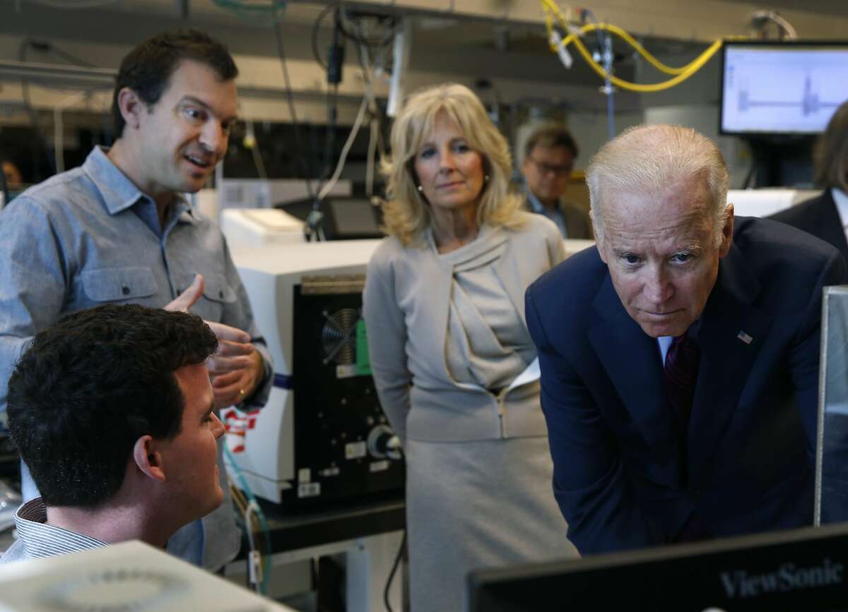 Vice President Joseph Biden and his wife Jill Biden observe a tissue engineering project by associate professor Zev Gartner (upper left) and Alex Hughes before the Bidens participate in a panel discussion on cancer research at the UCSF Mission Bay campus in San Francisco, Calif. on Saturday, Feb. 27, 2016.