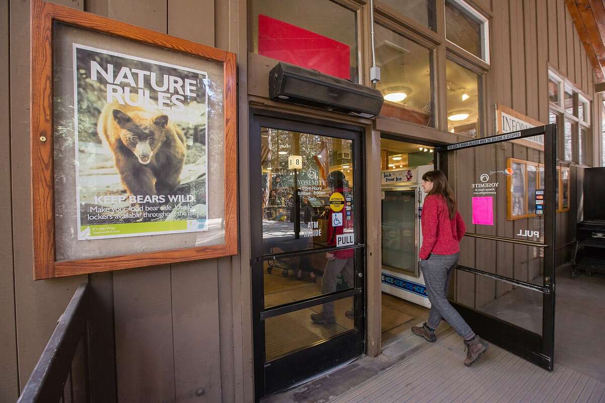 A customer walks into the Village Store at Yosemite National Park on Feb. 26.