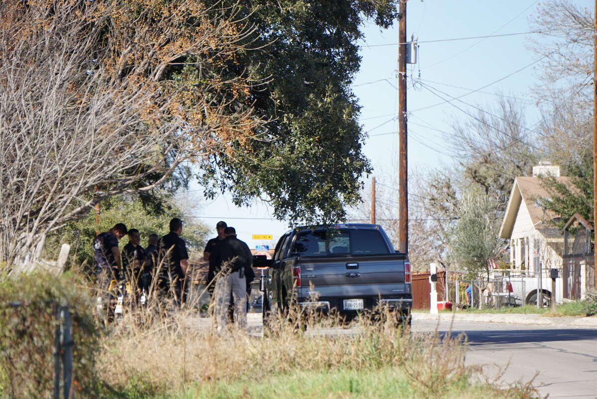 San Antonio emergency crews respond to a home on the Southwest Side near Pearsall Park on Saturday, Feb. 27, 2016, where workers discovered a crate of live ammunition.