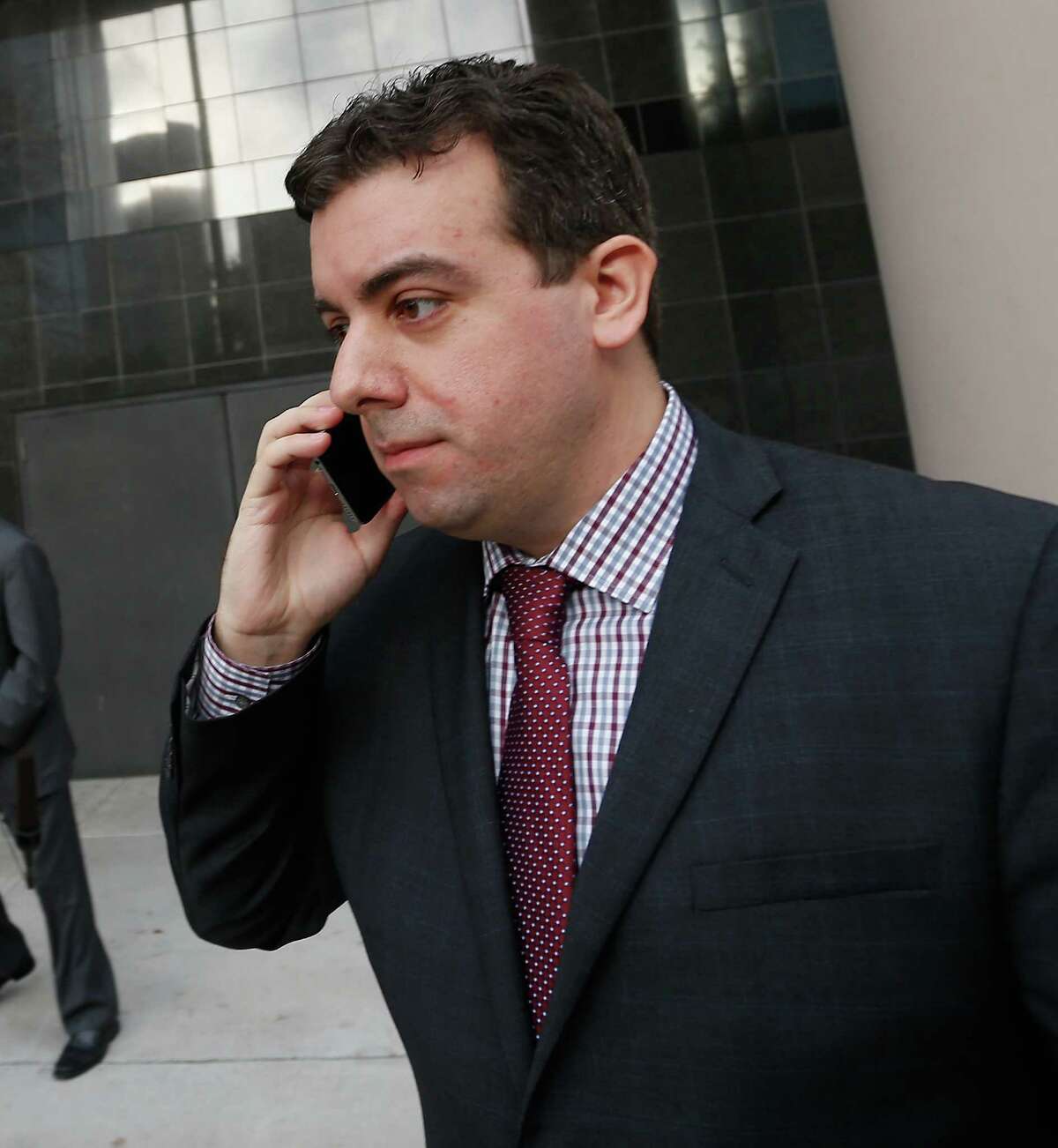 Chris Correa, the former director of scouting for the St. Louis Cardinals, leaves the Bob Casey Federal Courthouse, Friday, Jan. 8, 2016, in Houston. Correa pleaded guilty to five counts of unauthorized access of a protected computer, access authorities said dated back several years. (AP Photo/Bob Levey)