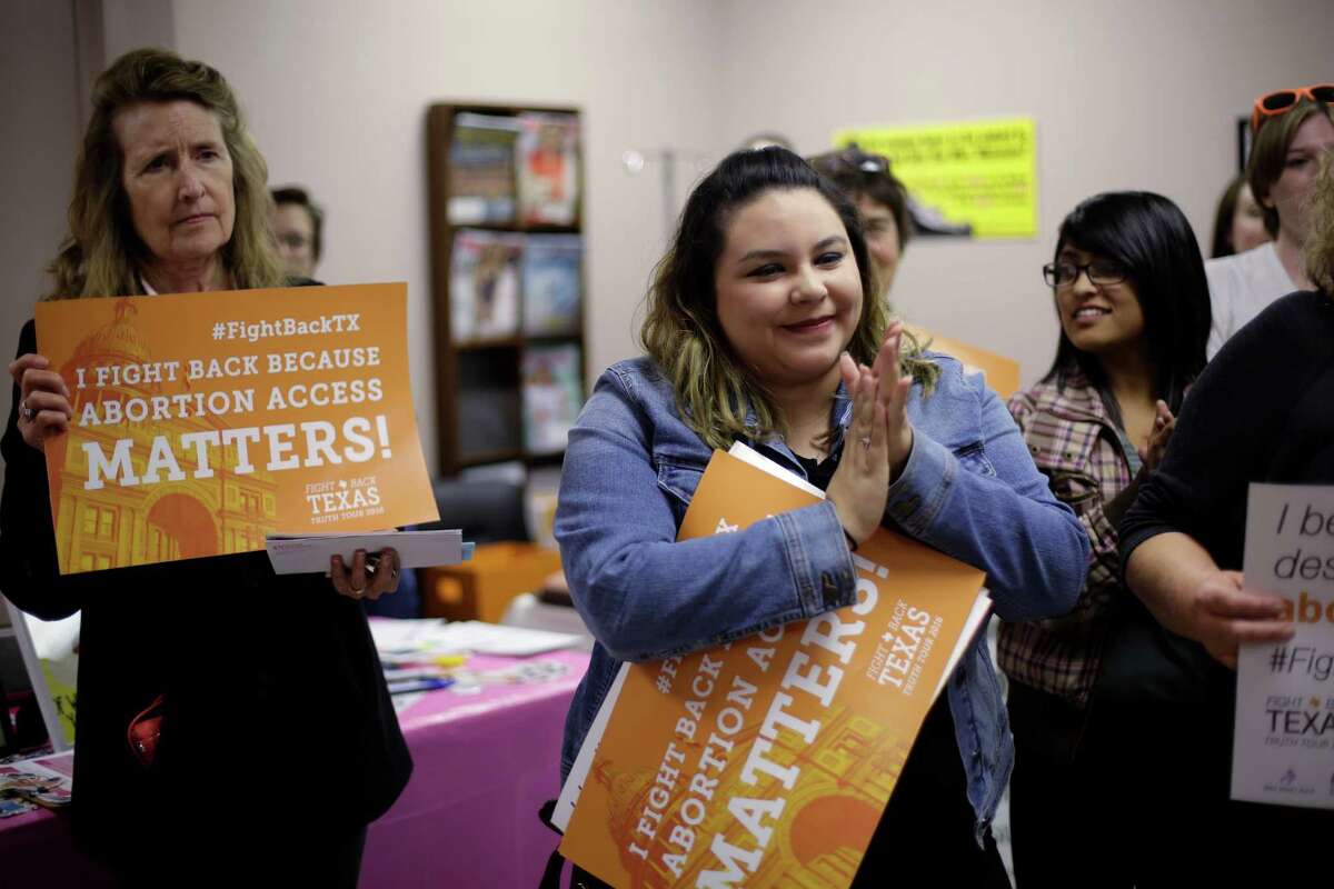 Giovanna Valverde, center, attends a recent gathering at Whole Woman's Health of San Antonio. The Supreme Court this week will hear Whole Woman's Health's challenge to HB2, which requires abortion clinics to become surgical centers.