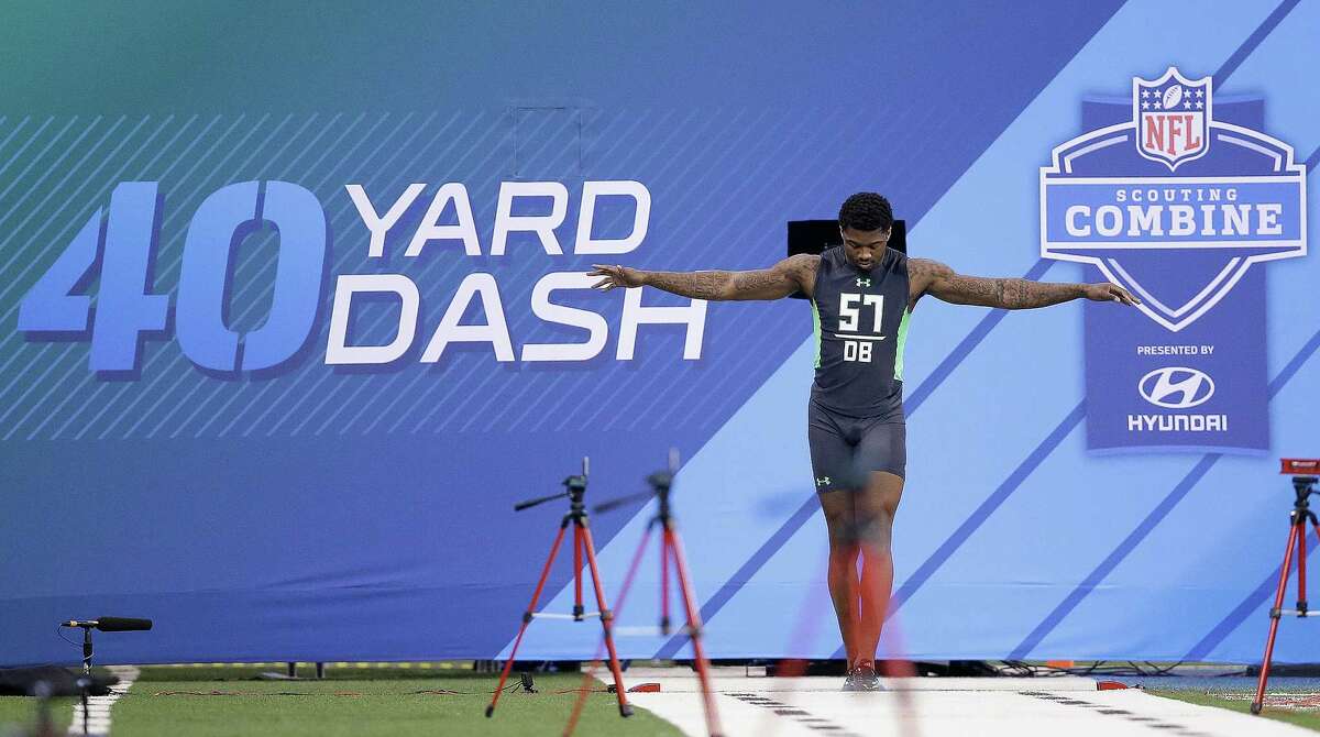 Texas A&M defensive back Brandon Williams prepares to run the 40-yard dash at the NFL football scouting combine on Monday, Feb. 29, 2016, in Indianapolis. (AP Photo/Darron Cummings)