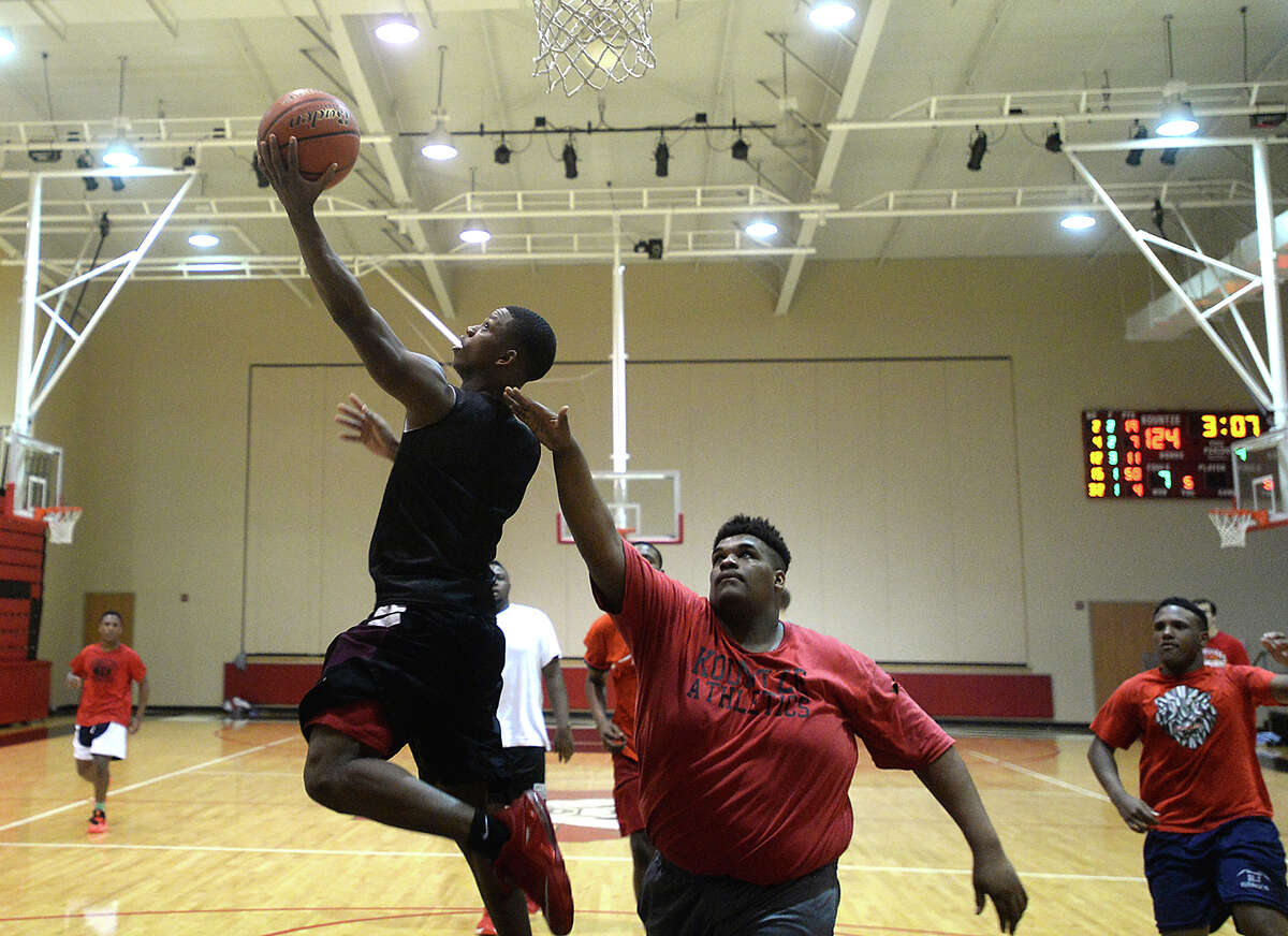 Senior starter Grayland Arnold goes for a lay-up as the Kountze Lions get in a final practice before facing Crockett in their regional quarterfinal match-up Tuesday. Arnold is a driving force behind the Lions and hopes to lead the team back to the state tournament. Photo taken Monday, February 29, 2016 Kim Brent/The Enterprise