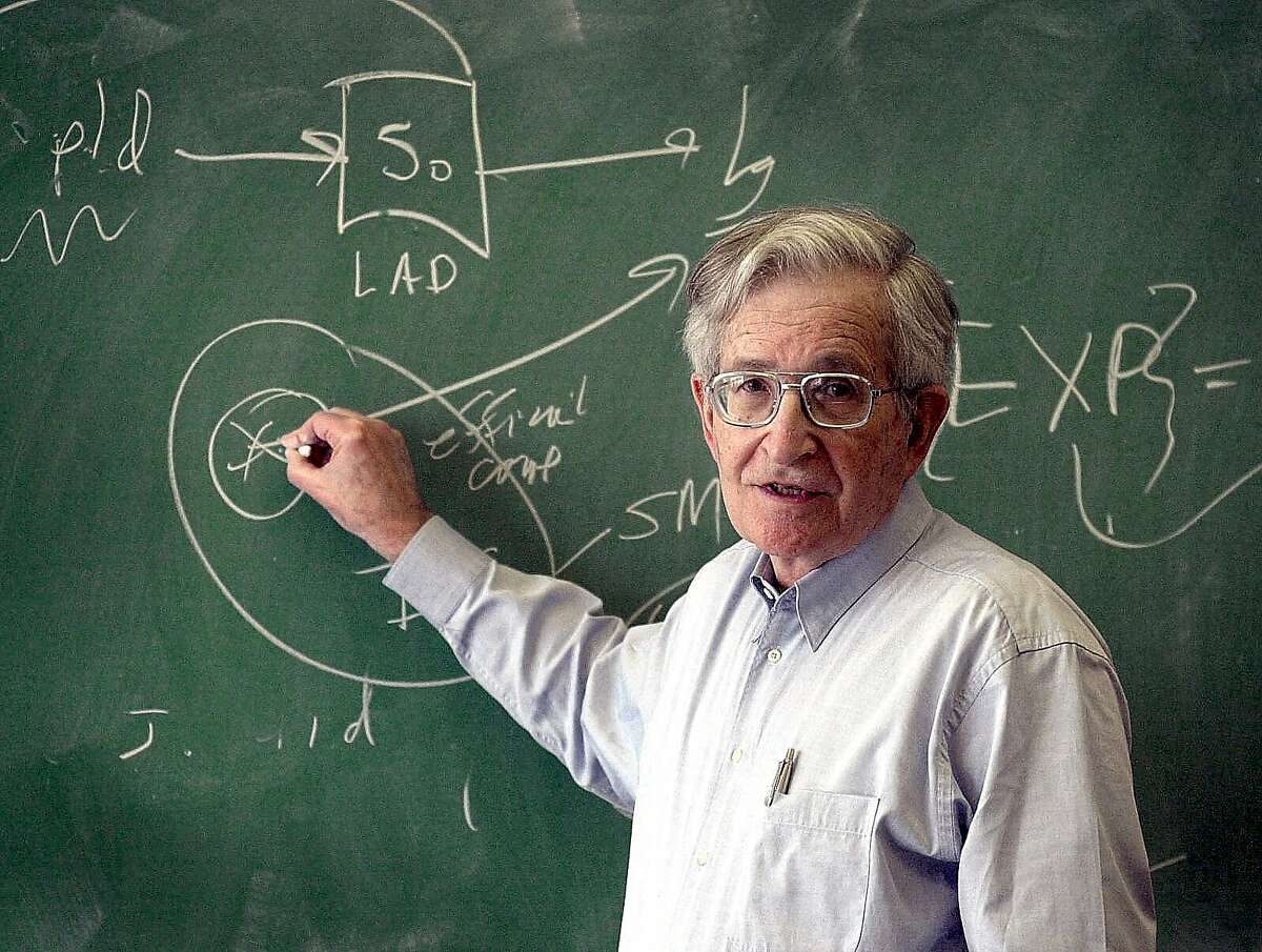 Well-known M.I.T professor for almost 50 years, Noam Chomsky, discusses a linguistics theory with students at Portmsouth High School in Portmsouth, N.H., Monday, May 21, 2001. Chomsky spoke to the Dr. Tony Thielle's linguistic class for about an hour. (AP Photo/Portsmouth Herald, Rich Beauchesne)