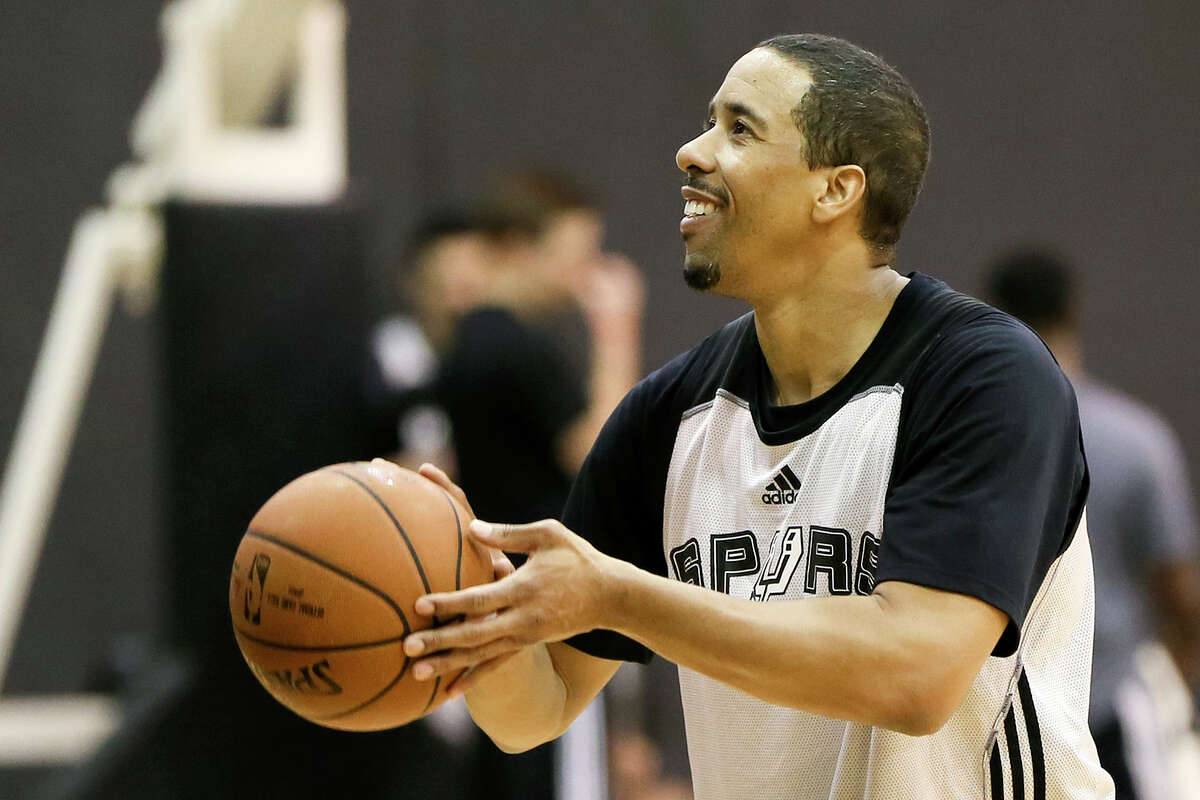 The newest Spurs roster addition, veteran guard Andre Miller, shoots free throws during his first workout at the Spurs practice facility on Tuesday, March 1, 2016.