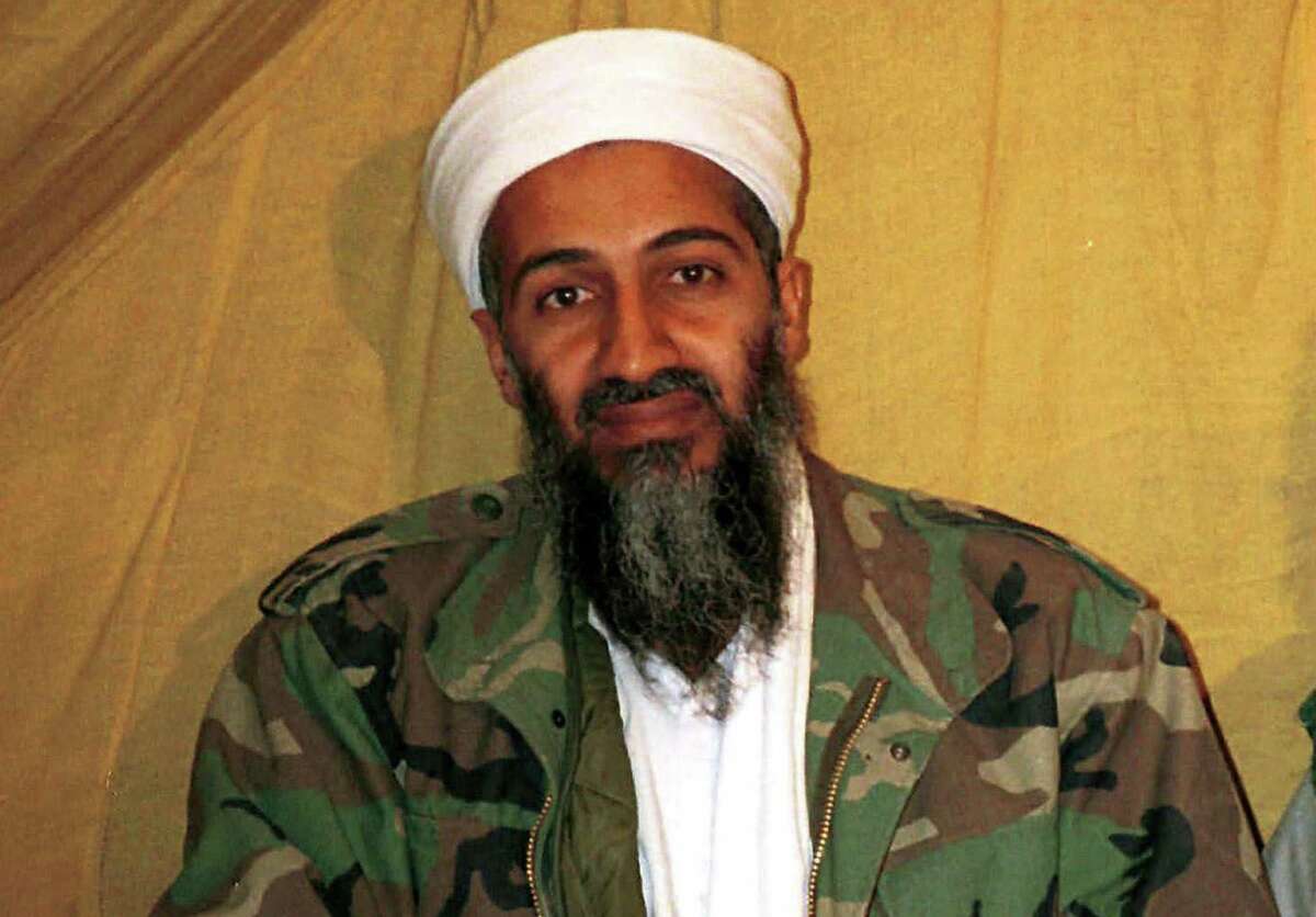 FILE - In this undated file photo Osama bin Laden is seen in Afghanistan. In his last will and testament, bin Laden claimed he had about $29 million in personal wealth, the bulk of which he wanted to be used "on jihad, for the sake of Allah." The will was released Tuesday, March 1, 2016, in a batch of more than 100 documents seized in a May 2011 raid that killed bin Laden at his compound in Abbottabad, Pakistan. (AP Photo)