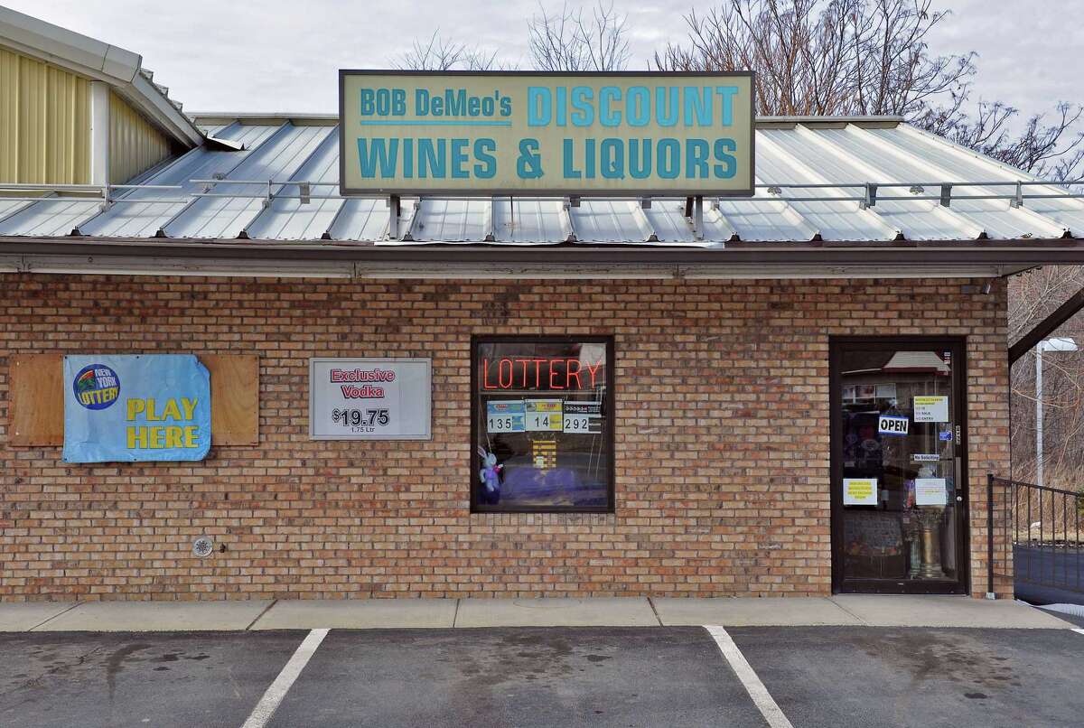 Accused Troy liquor store robber was on parole for murder