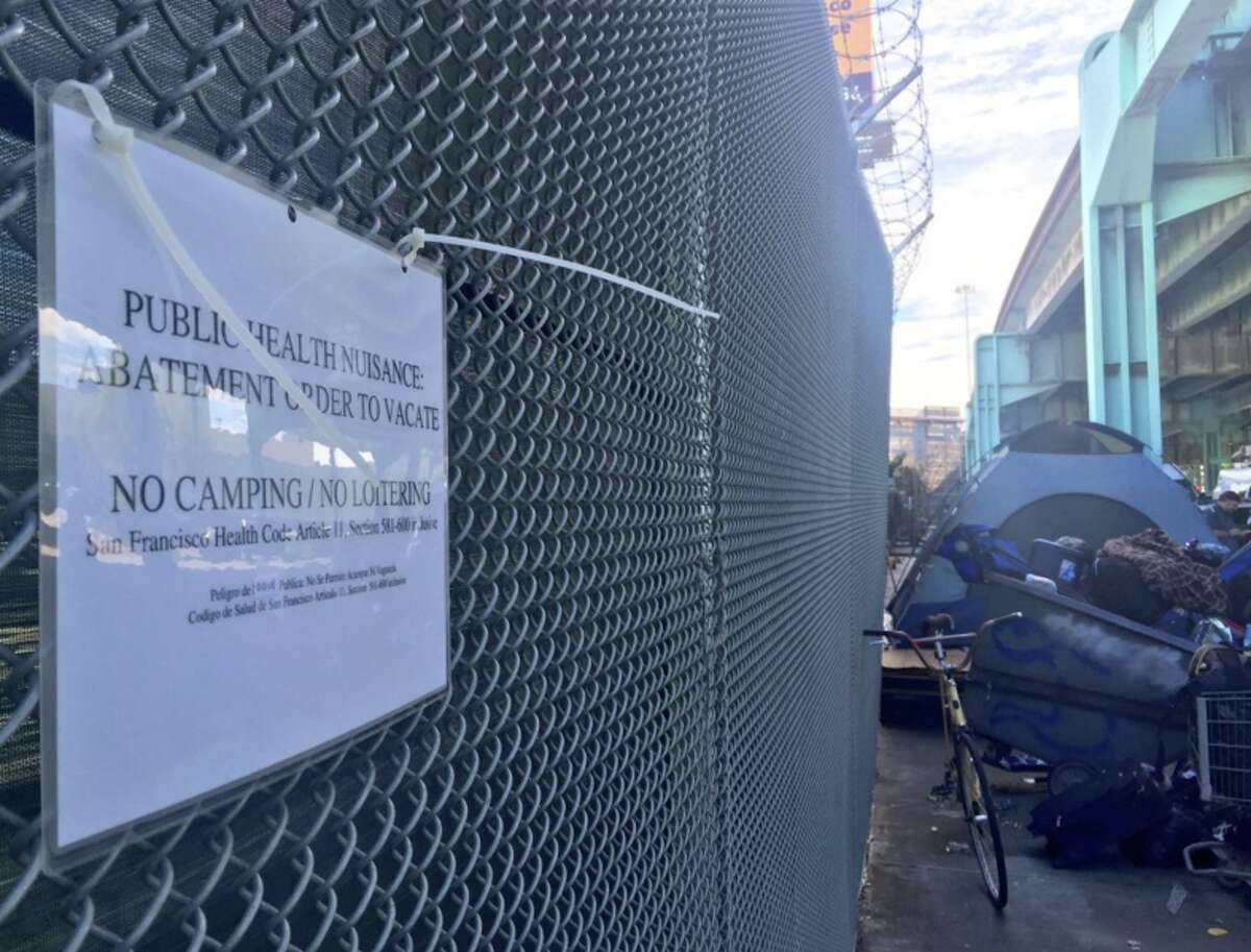 Public nuisance signs went up as the last tent on Division Street was broken down in San Francisco on Tuesday, March 1, 2016.