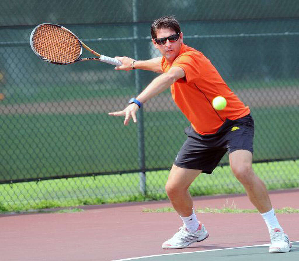 Juan Arraya prepares to hit during the final of the men’s open match during the Greenwich Town Tennis championships at Binney Park in Old Greenwich on Aug. 1. Arraya, an Old Greenwich resident, will be playing with Stamford resident Max Le Pivert in the upcoming National Platform Tennis Tournament at Country Club of Darien this weekend.