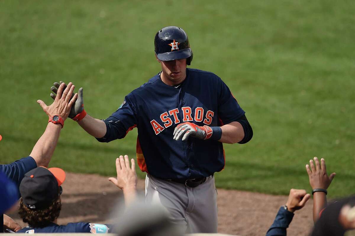 CLEARWATER, FL - MARCH 03: Matt Duffy #19 of the Houston Astros celebrates with teammates following a fifth inning home run against the Philadelphia Phillies at Bright House Field on March 3, 2016 in Clearwater, Florida.