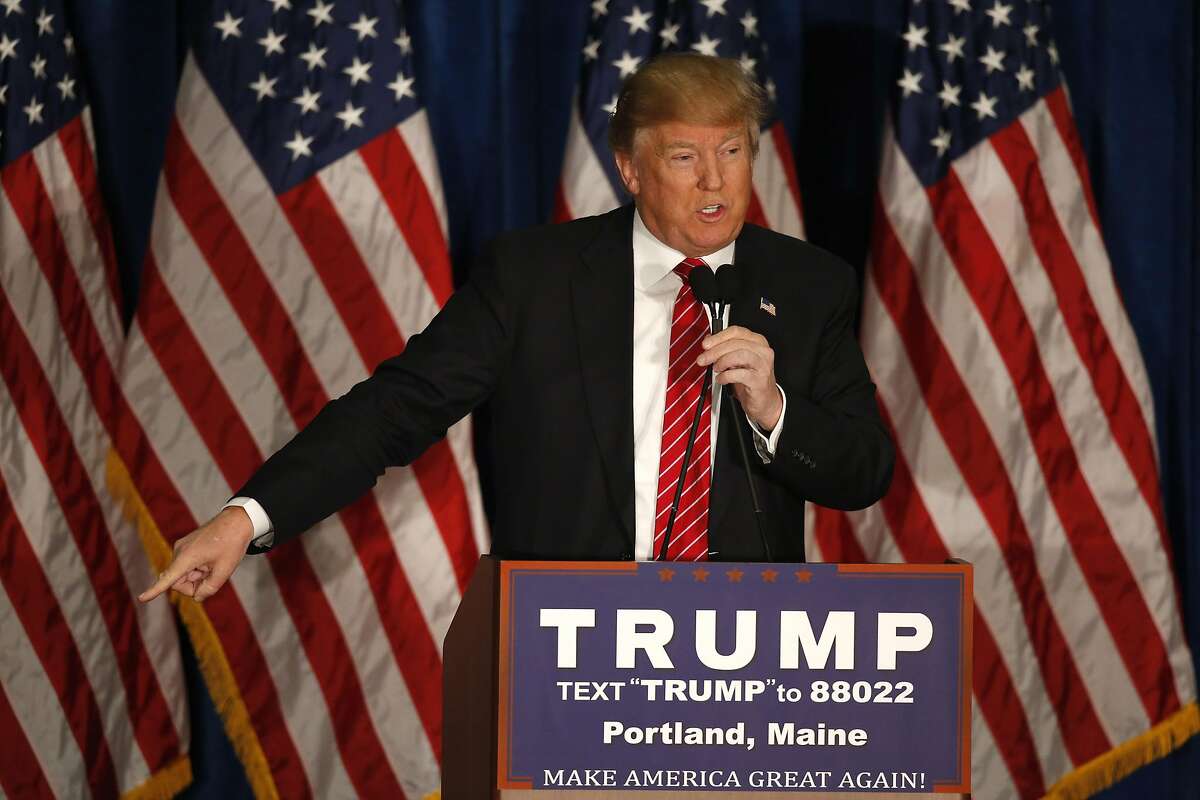 Republican presidential candidate Donald Trump says Mitt Romney had come to him begging for for help, Thursday, March 3, 2016, during a campaign stop in Portland, Maine.(AP Photo/Robert F. Bukaty)