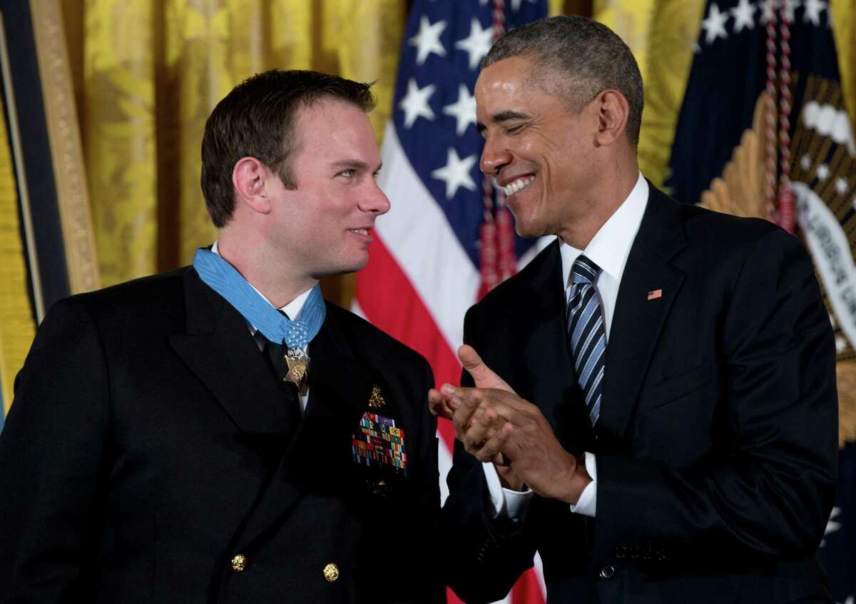 President Barack Obama after presents the Medal of Honor to Senior Chief Special Warfare Operator Edward Byers during a ceremony in the White House last month. Readers disagree on the job Obama has done over the past seven years and counting.